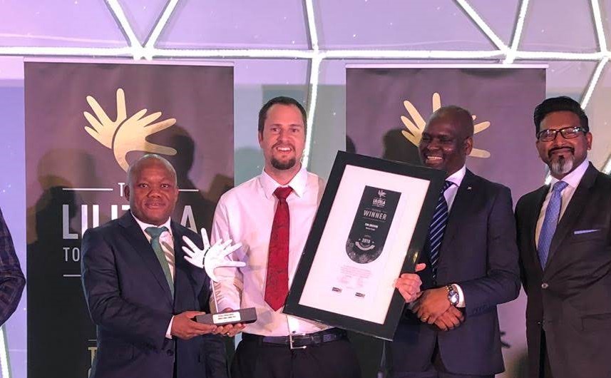 Lilizela Awards : Tim Brown Tours Wins : And We Remember